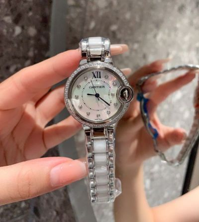 Cartier Balloe Bleu Swiss Quartz Movement 33MM Fisheye Glass Mother of Pearl Dial Silver Bracelet Watch